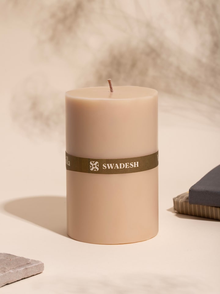 Side view of Vanilla Pillar Candle (4.5 inches) highlighting candle shape and size