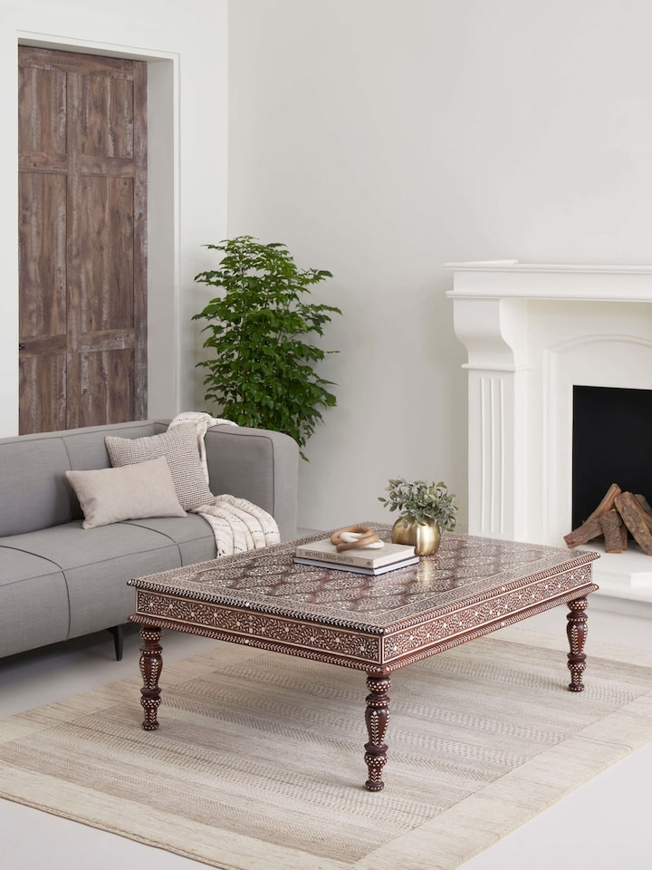 Side view of Bone Inlay Sheesham Wood Coffee Table highlighting its elegant craftsmanship and fine bone inlay detailing.