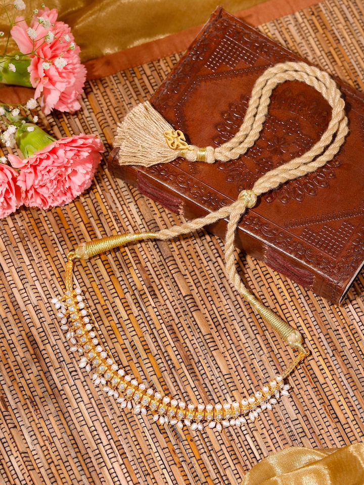 Styled detail view of Guttapusalu Silver Choker worn around the neck, shown in an alternate styled shot