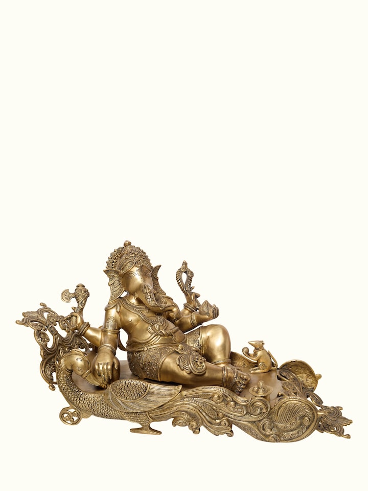 Angled view of the Brass Ganesha Sitting Peacock Idol