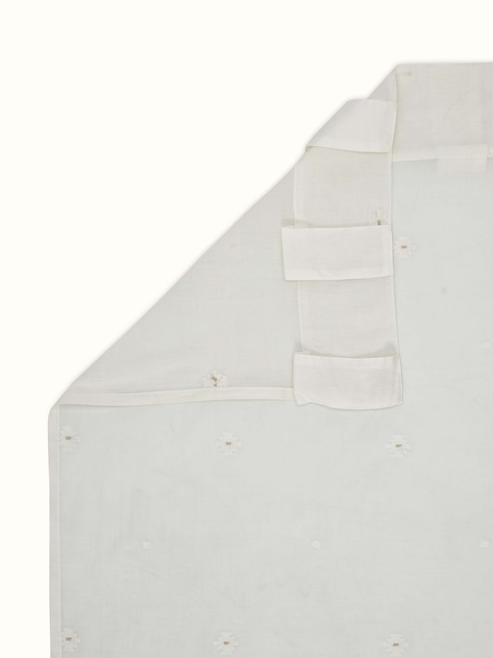 Back view of Kalpanama Ivory Buti Cotton Curtain, featuring clean pleats and hanging loops.