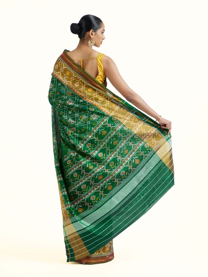 Back view of Rajkot Patola Ikat Saree emphasizing the overall design and fine details