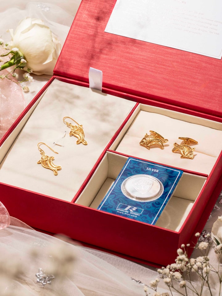 Lifestyle view of silver filigree silver his hers gift box