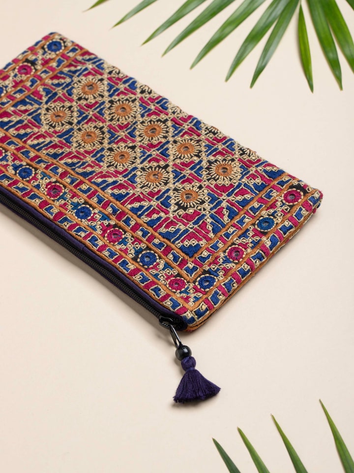 Side view of Kutchi Embroidered Clutch Bag focusing on the intricate patterns and craftsmanship