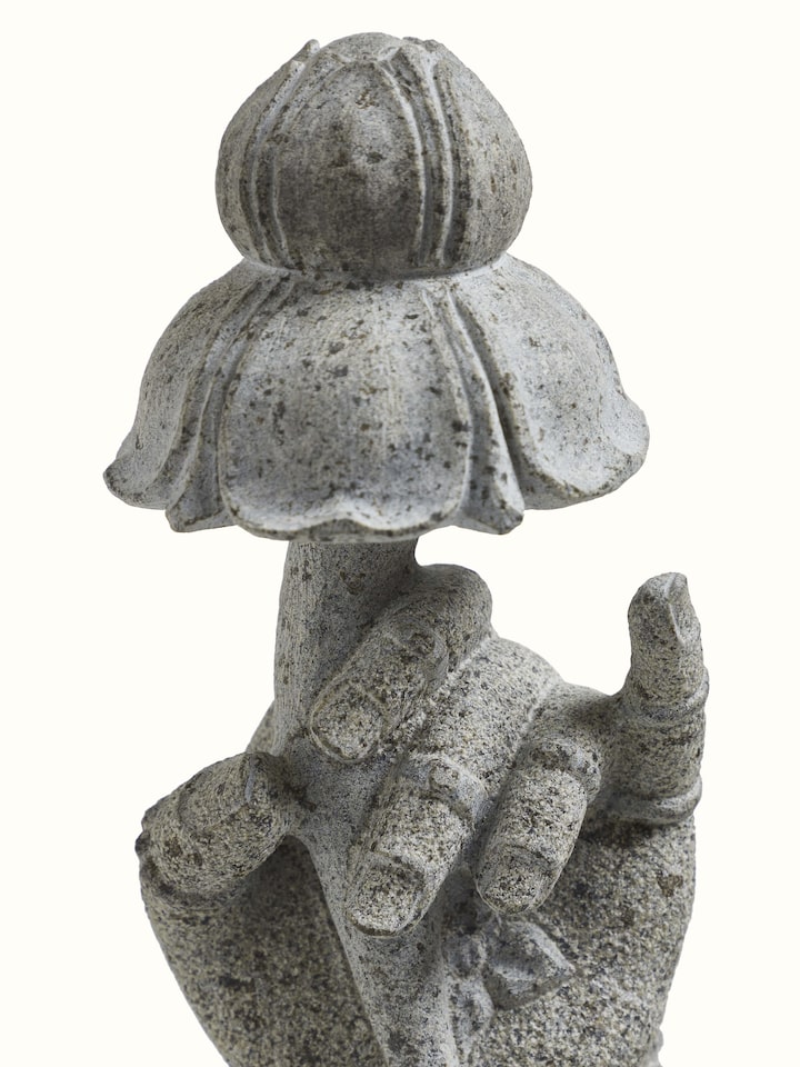 Close-up detail of the Stone Carved Deity Hand Sculpture