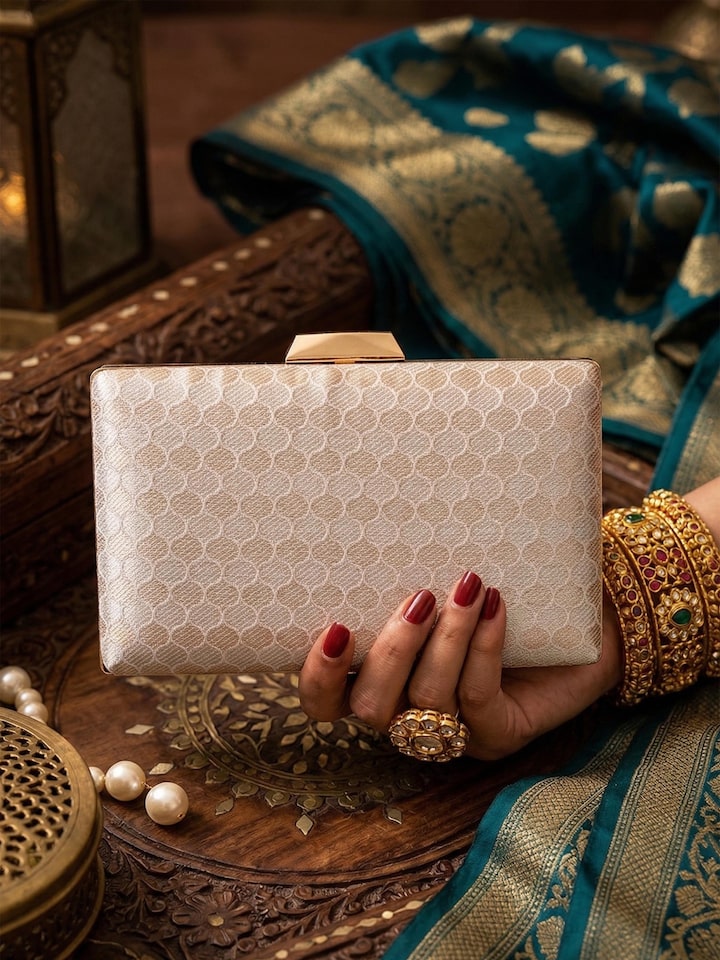Alternate side view of the Silver Handwoven Brocade Clutch