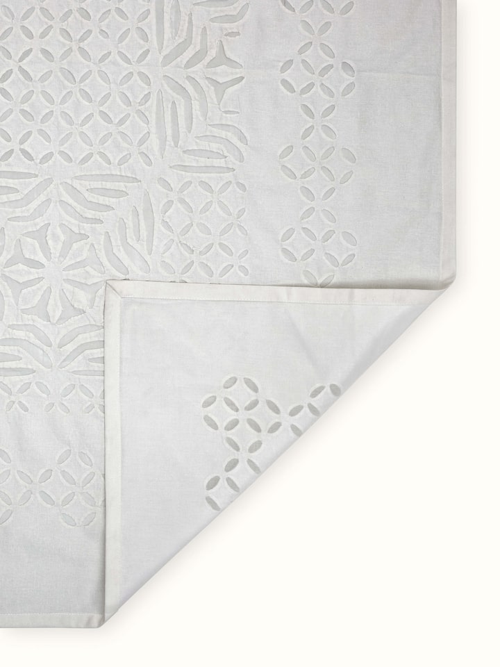 Back view highlighting the hem and finishing details of the table cover