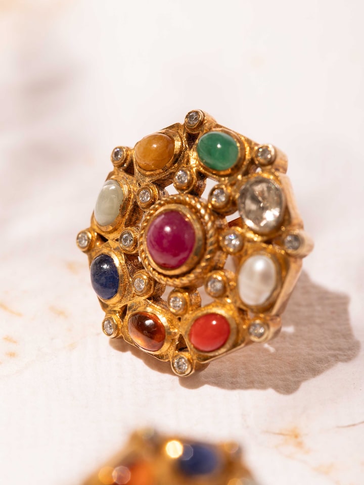 Detail view of Navratna Silver Studs highlighting the stone setting and metalwork detail