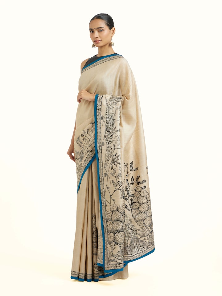 Side view of tussar silk Pattachitra saree highlighting soft silk drape