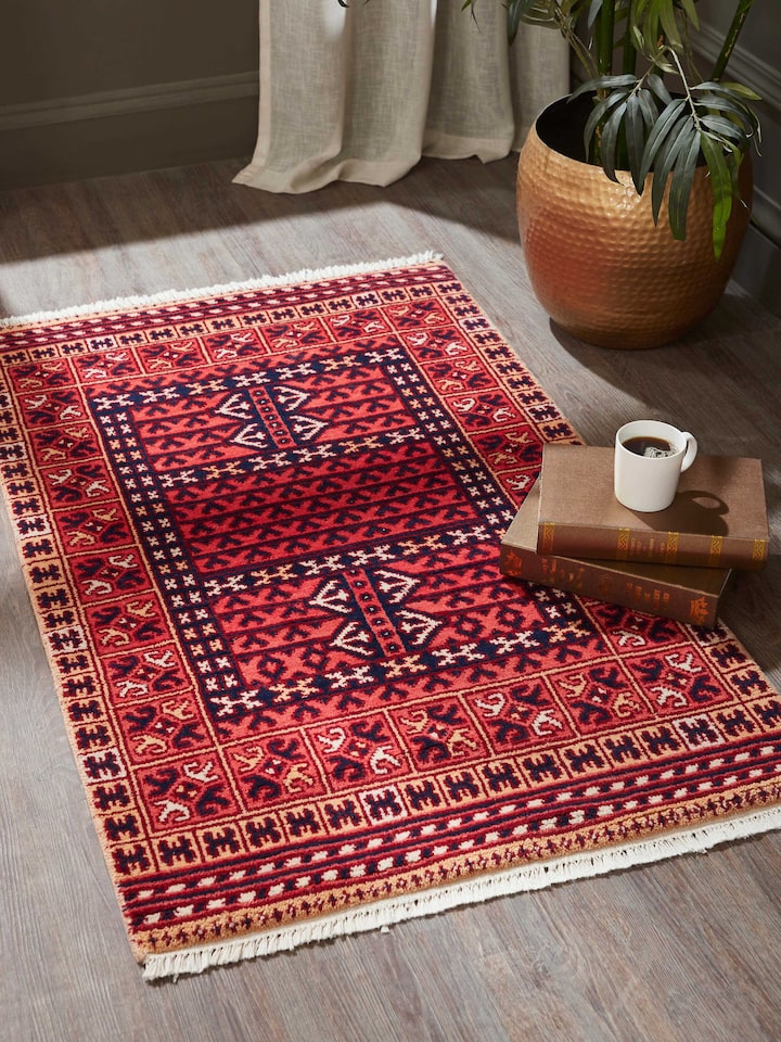 Top view highlighting the runner’s full length and rich traditional motifs