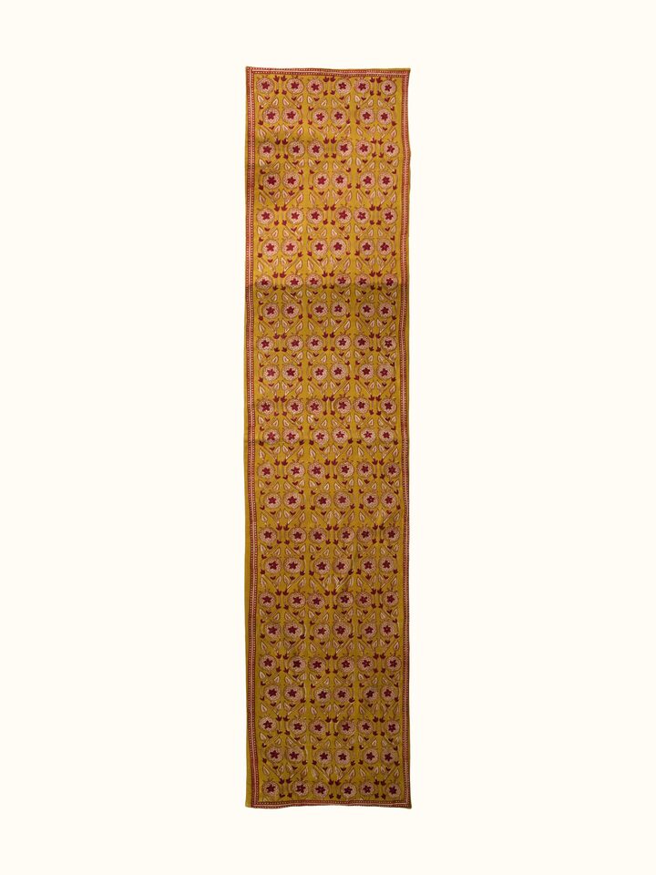 Front view of the Swadesh Marigold Hand Block Dabu With Embroidery Floral Bed Runner