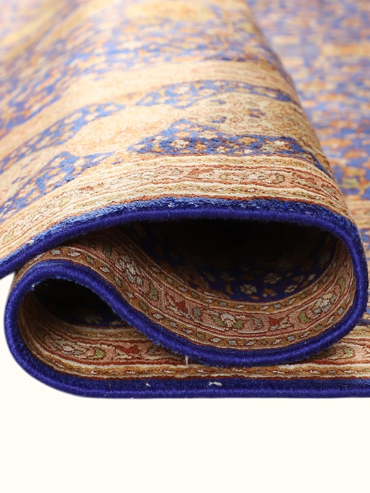 Detailed view of the Traditional Persian Royal Blue Rust Ardabil Kashmir Silk Hand-Knotted Carpet craftsmanship