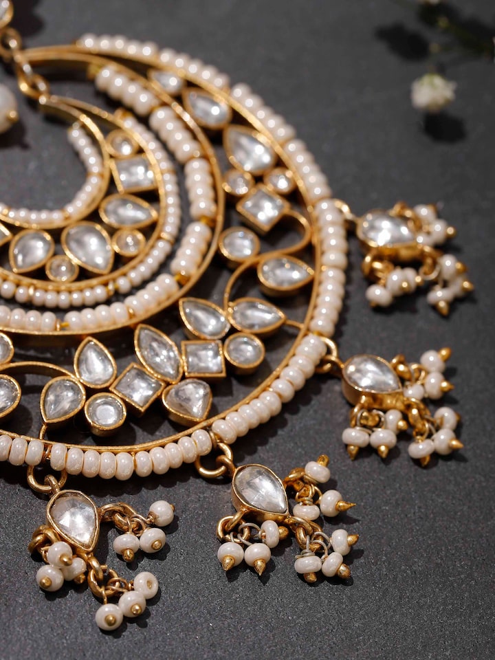 Back view showing the finishing and structure of the earrings.
