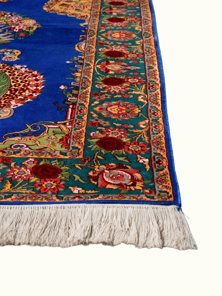 Close-up view of Traditional Persian Blue Guldani Kashmir Silk Hand-Knotted Carpet highlighting the hand-knotted weave and motif detail