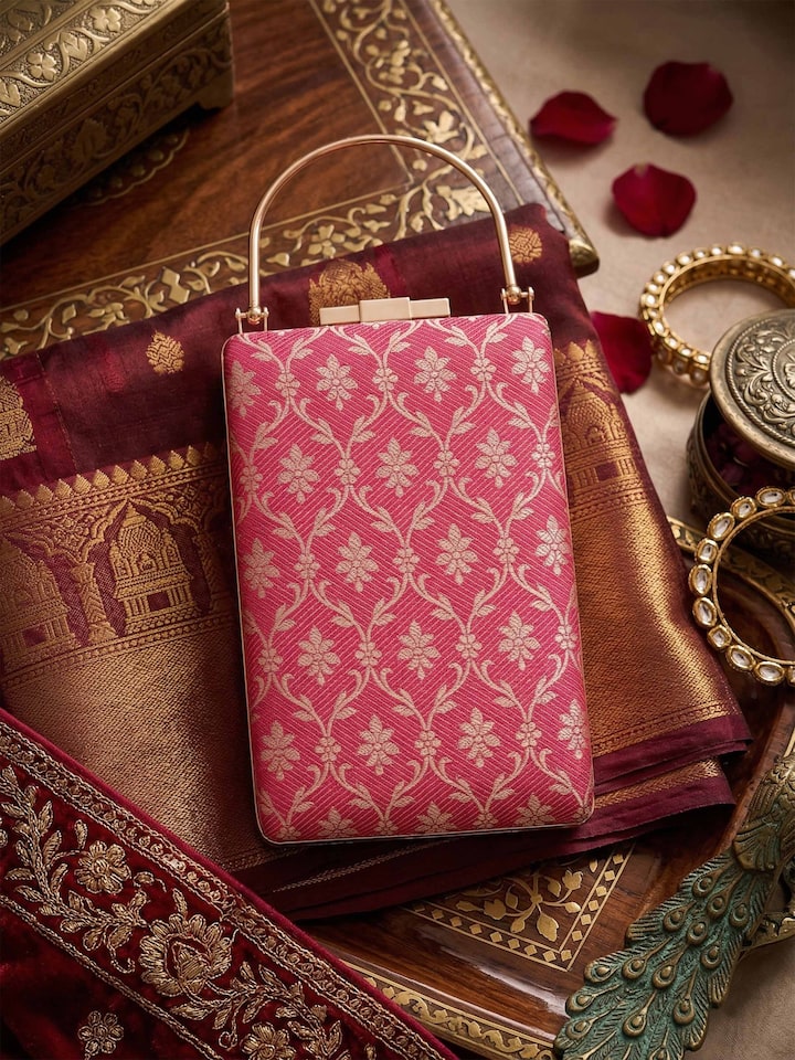Styled view of Pink Banarasi Silk Handbag showing the bag styled with an outfit