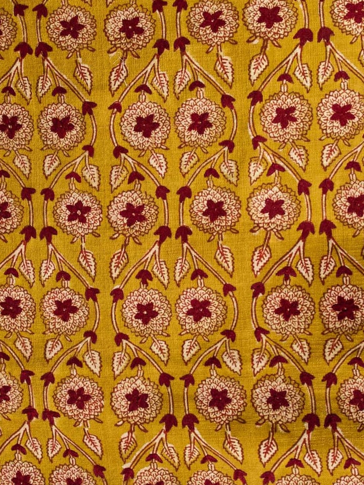 Detailed view of the Marigold Hand Block Dabu With Embroidery Floral Bed Runner craftsmanship