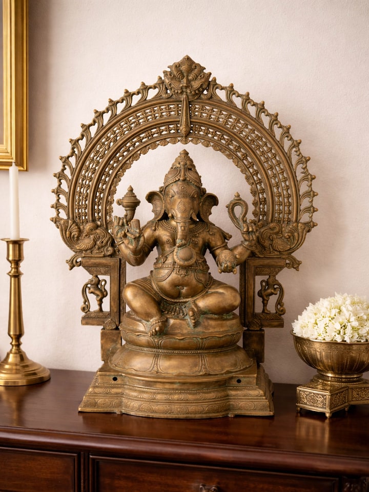 Side view of the Bronze Sitting Ganesha Prabhavali Idol