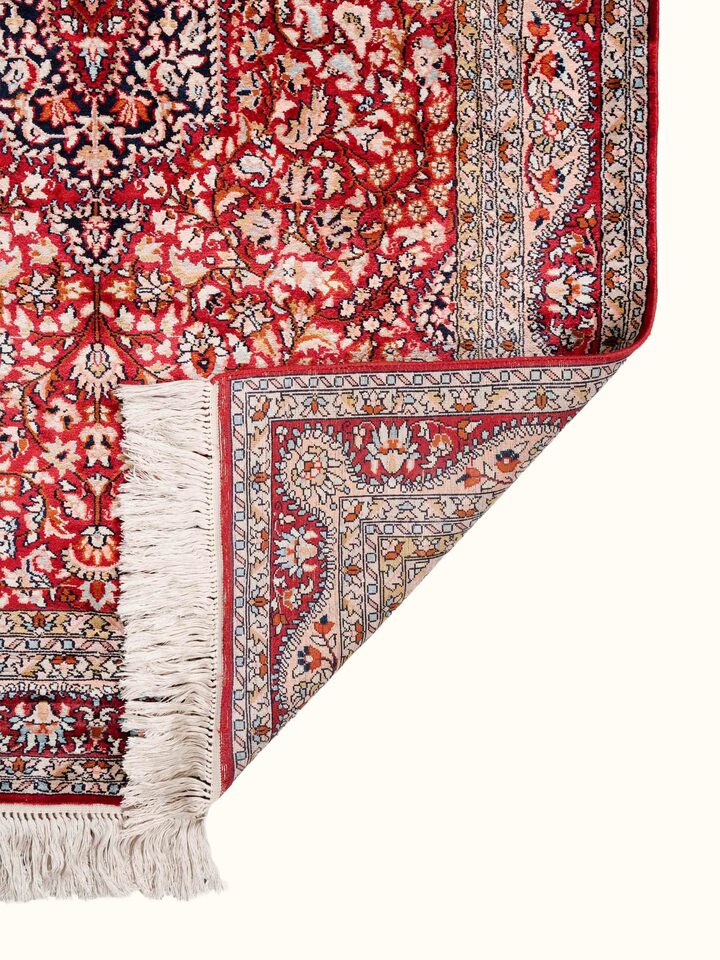 Back view of Traditional Persian Red Kashan Kashmir Silk Hand-Knotted Carpet showing the reverse weave