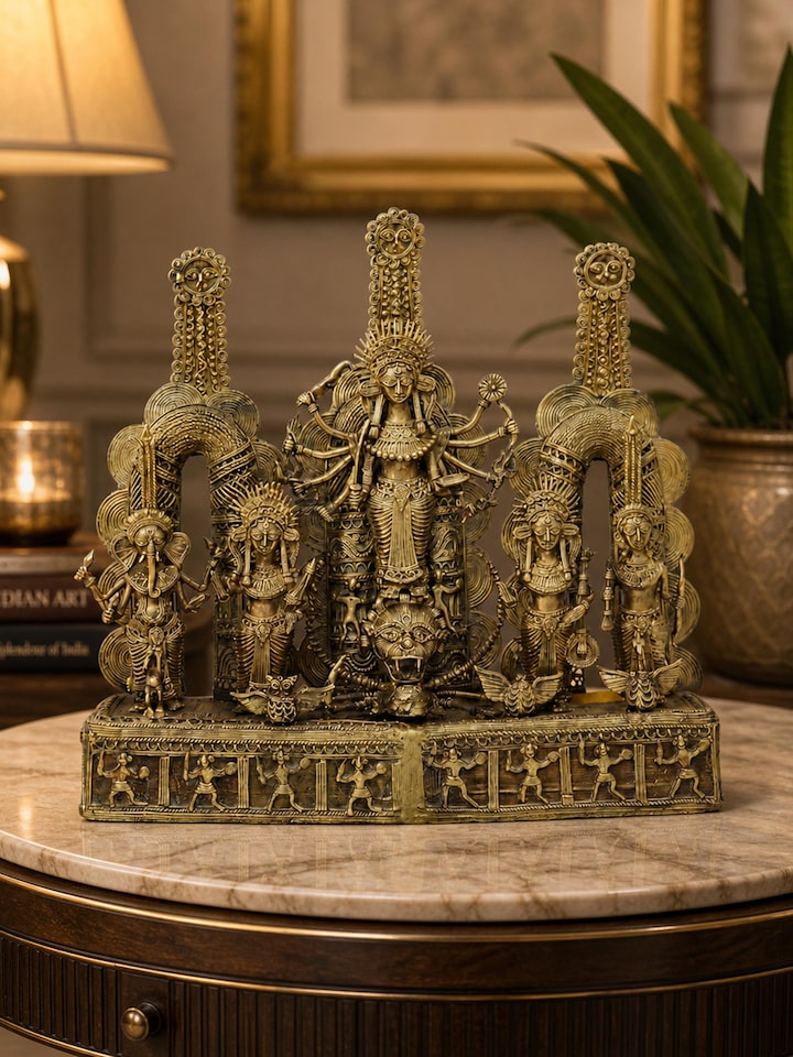 Side view of the Beatific Dhokra Brass Creator Goddess Idol