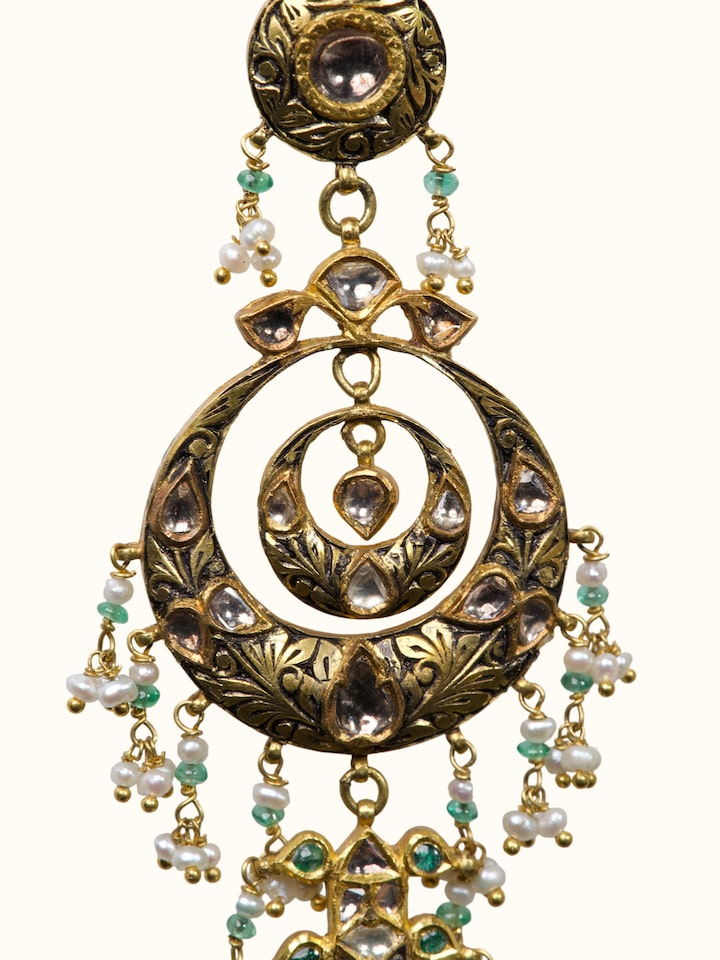 Detailed side view of the Partash 18 Karat Gold Drop Earrings