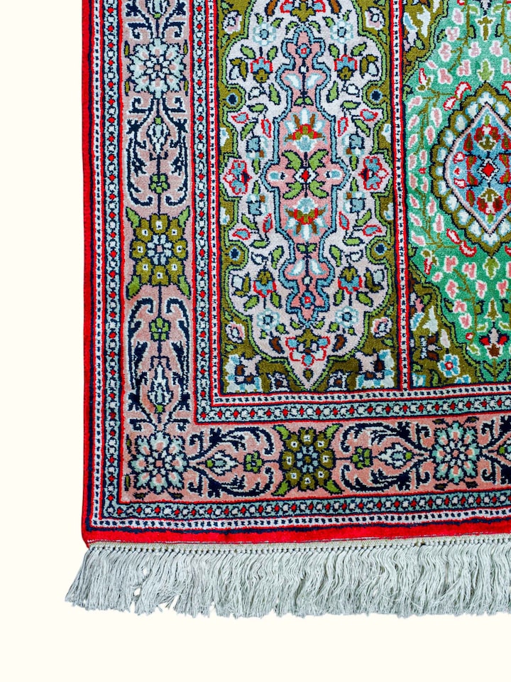 Close-up of the Traditional Persian Green Gum Kashmir Silk Hand-Knotted Carpet