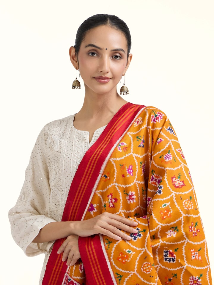 Angled view of Patan Patola Handloom Silk Dupatta revealing the depth of its color and intricate pattern