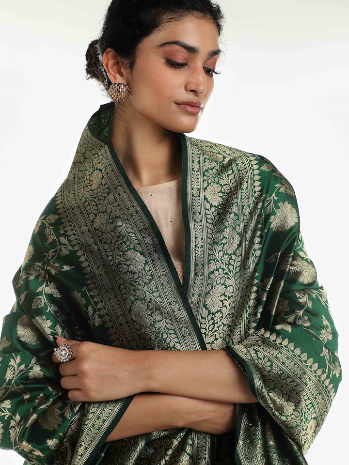 Detail view of dark green silk Banarasi dupatta with fabric texture and zari weave