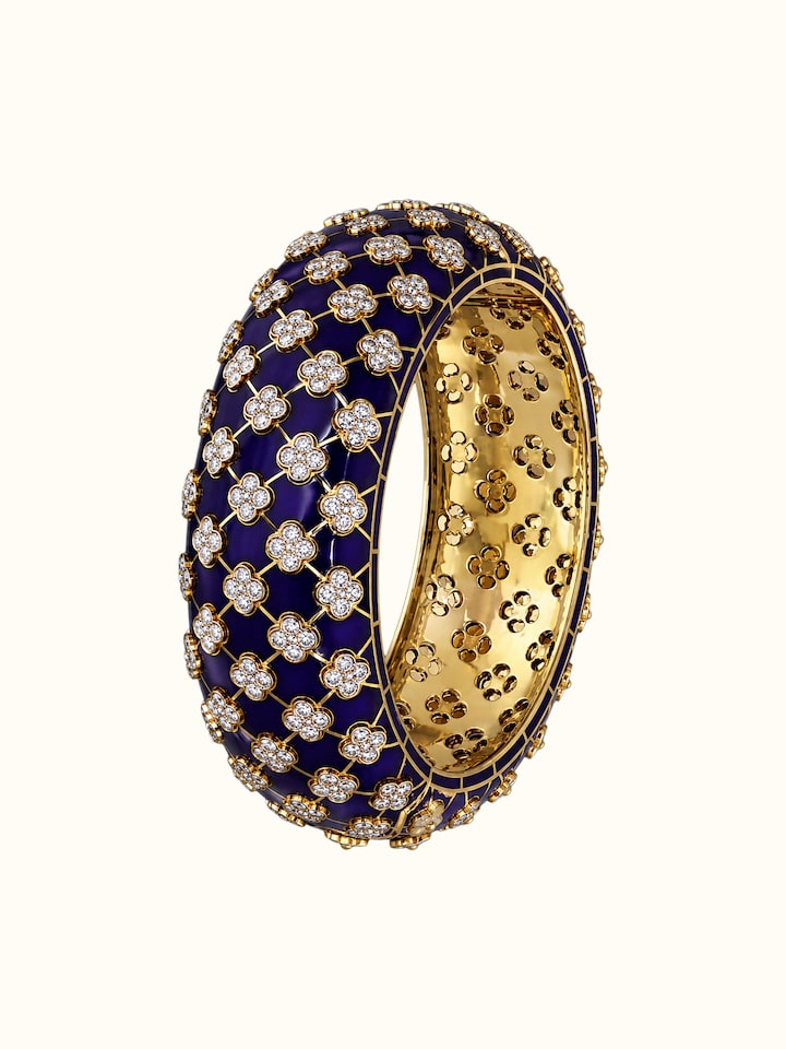 Close-up view of Open Setting 14 Karat Yellow Gold Bangle with Diamonds highlighting the stone setting and metalwork detail