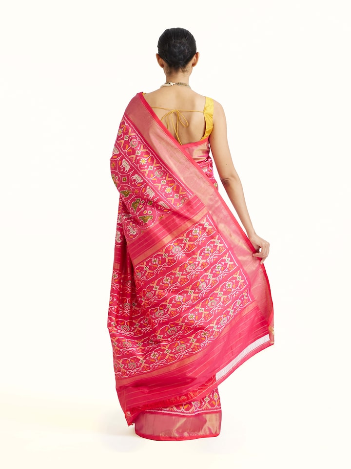Back view of Light Pink Weft Ikat Silk Saree emphasizing the overall design and fine details