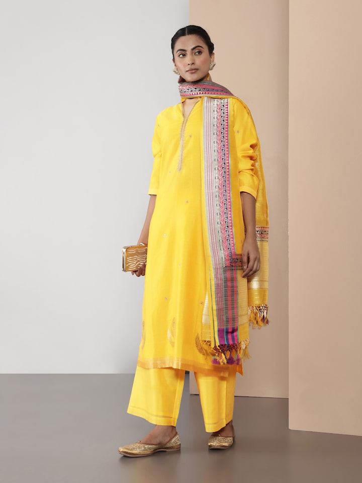 Side view showing pleats and soft sheen of fabric.