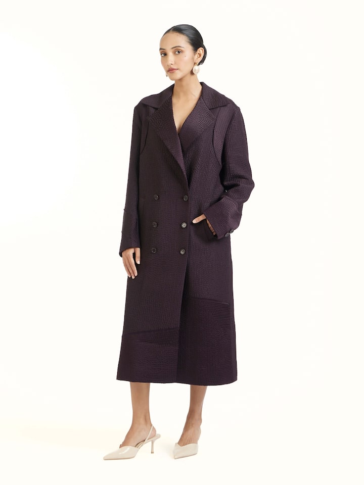 Side view of purple silk kantha trench coat with tailored silhouette
