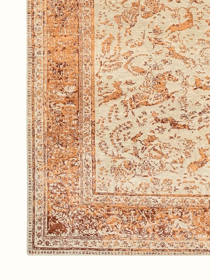 Detail view of Transitional Persian Ivory Rust Shikargah Bhadohi Wool & Bamboo Silk Hand Knotted Rug highlighting the intricate pattern and pile te...