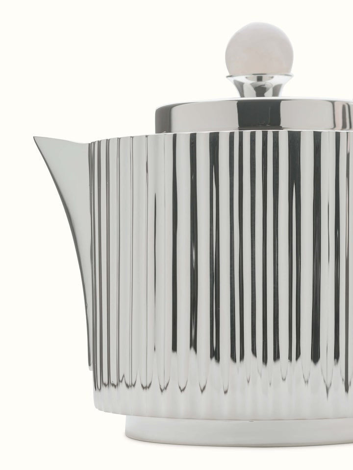 Detailed view of Silver Water Reed Tea Set (3 Pcs), showing the intricate water reed designs and elegant craftsmanship of the tea set in silver.
