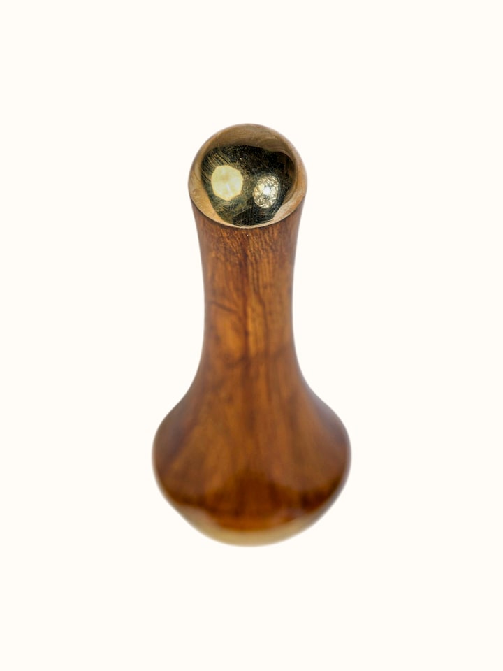 Top view of the Kansa Wand Ayurvedic Facial and Body Massage Tool