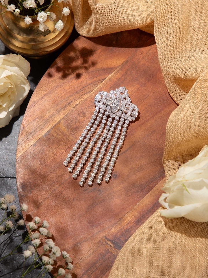 Styled detail view of Silver Smithing Brooch Pin pinned onto fabric, shown in an alternate styled shot
