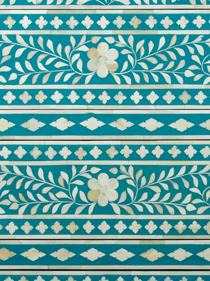 Detail view of Bone Inlay Chest of Drawers highlighting the woodwork and finish detail