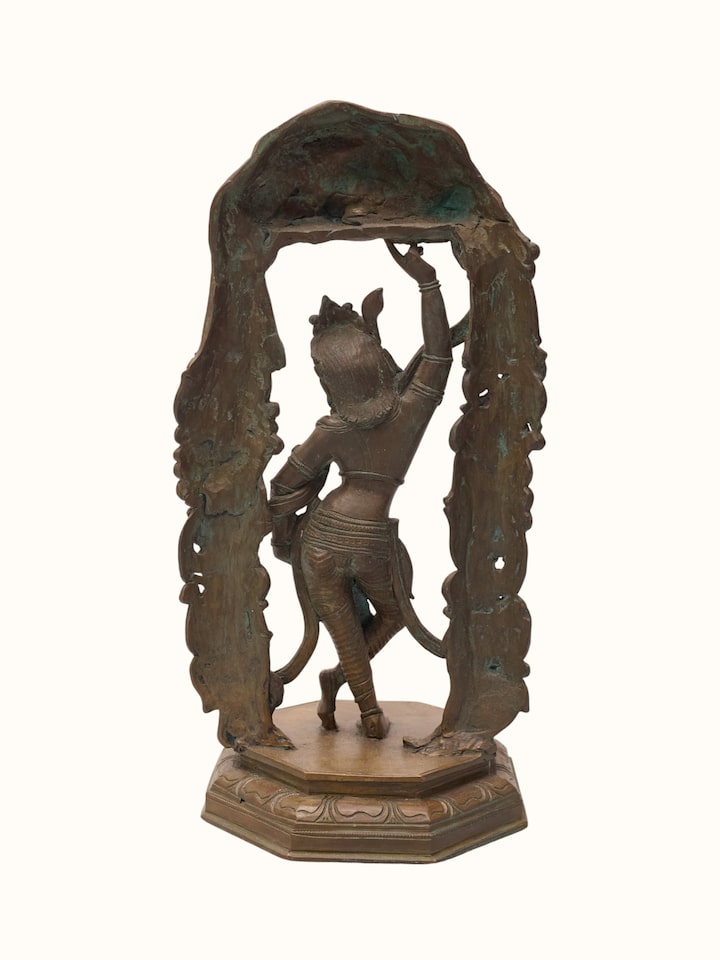 Rear view of the Bronze Cast Govardhana Krishna Idol