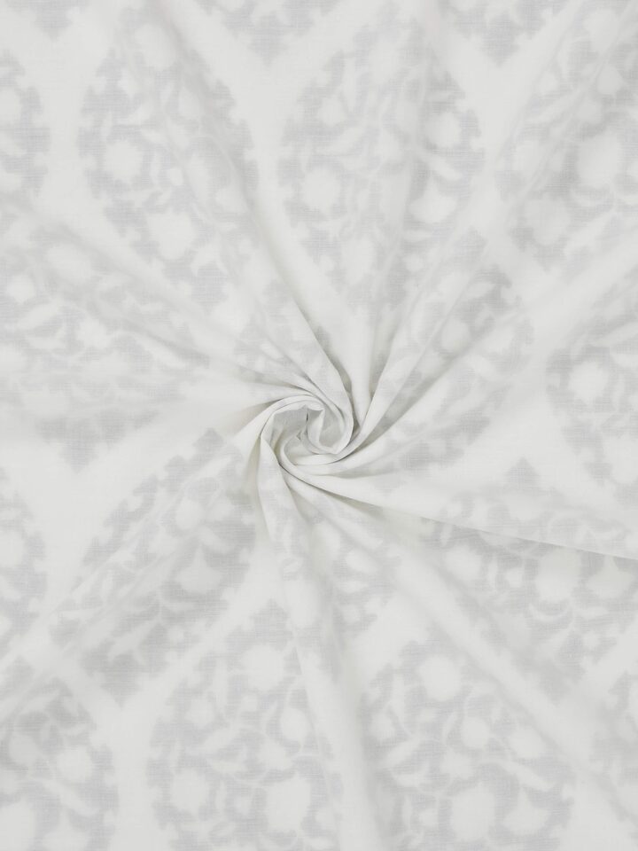 Close-up showing hand block print precision and breathable cotton fabric.