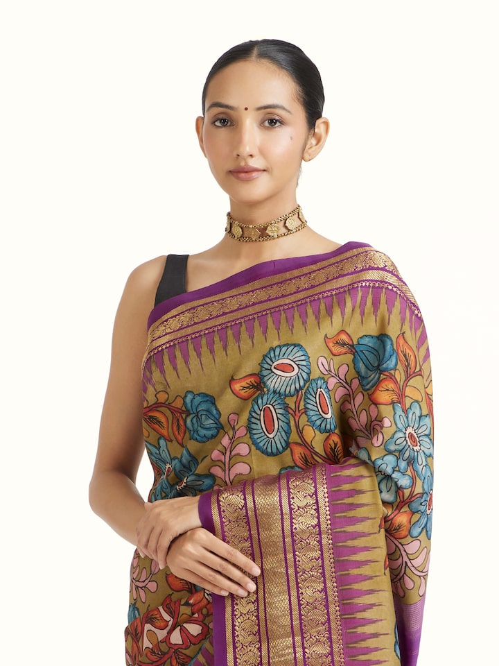 Angled view of Purple Kalamkari Hand‑Painted Saree revealing the depth of its color and intricate pattern