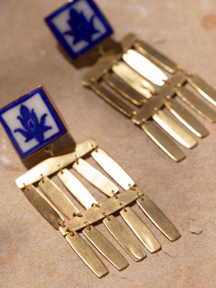 Detailed view of Blue Pottery Drop Earrings focusing on the intricate blue pottery and design