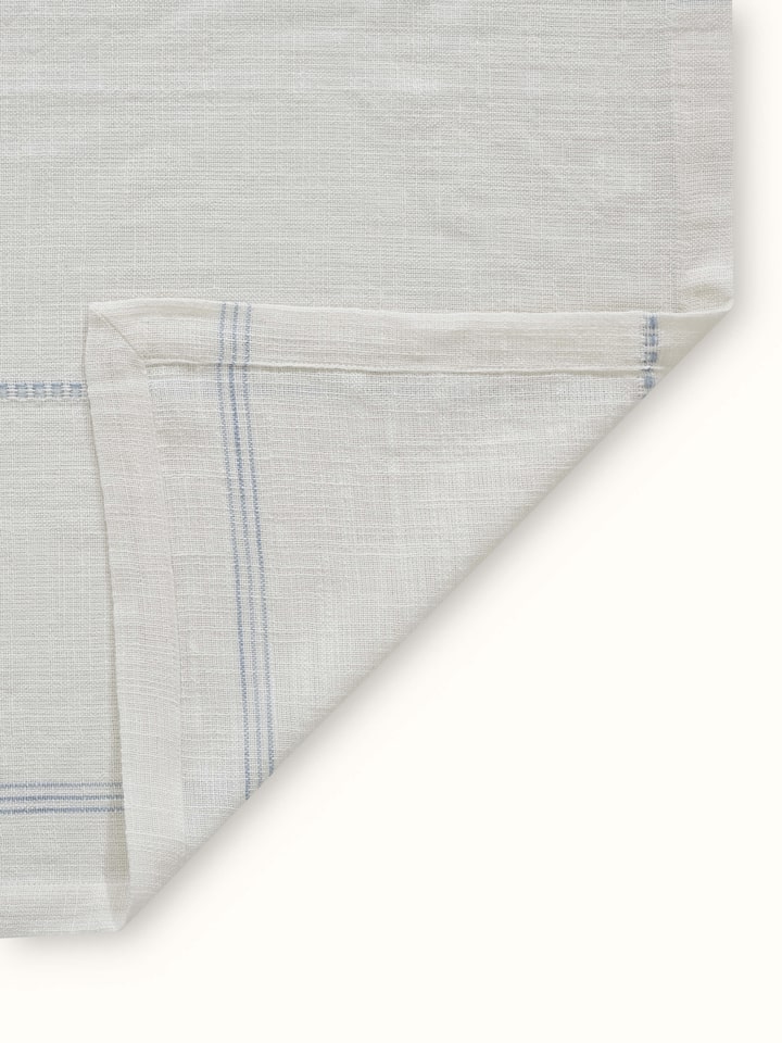 Back view of Arth Light Blue Stripe Handloom Cotton Table Cover for modern 6-seater dining tables