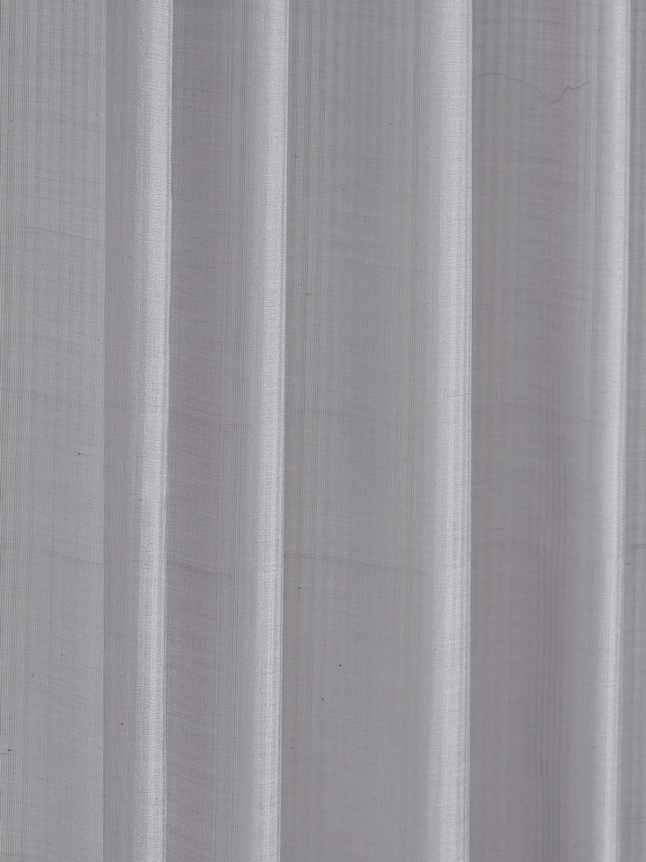 Detail shot highlighting the fine texture of silk cotton in Pragya Curtain