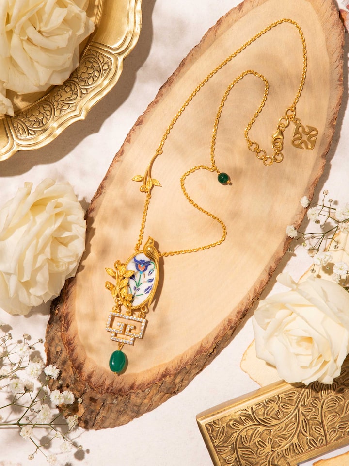 Side close-up showing the craftsmanship and chain details