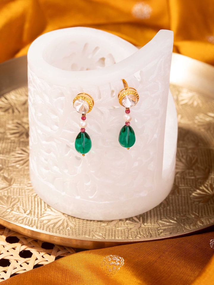 Lifestyle view of alternate Dank Polki earrings styled for bridal or celebratory wear.