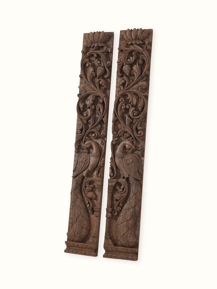 Angled view of the Wood Carved Peacock Panel (2 Pieces)