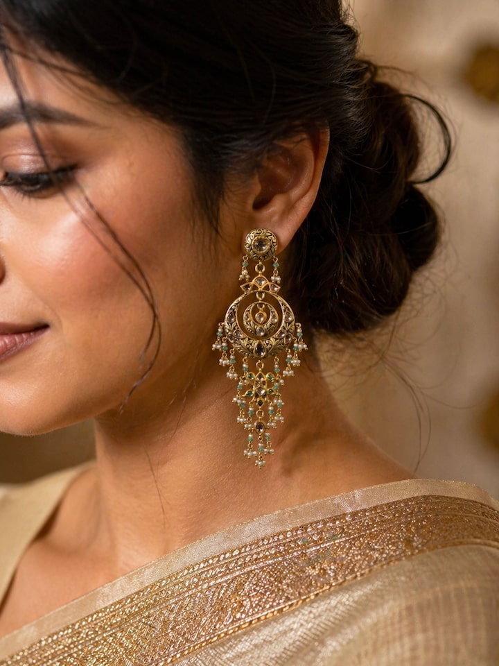Lifestyle view of the Partash 18 Karat Gold Drop Earrings