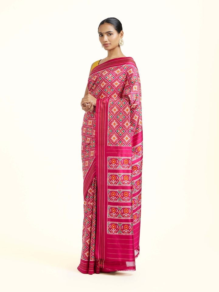 Angled view of the Pink Mulberry Silk Pochampally Double Ikat Handloom Saree