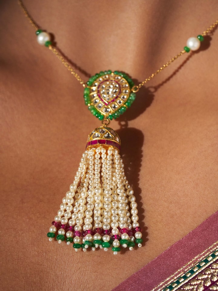 Angled view displaying the overall shine and elegance of the pendant and chain