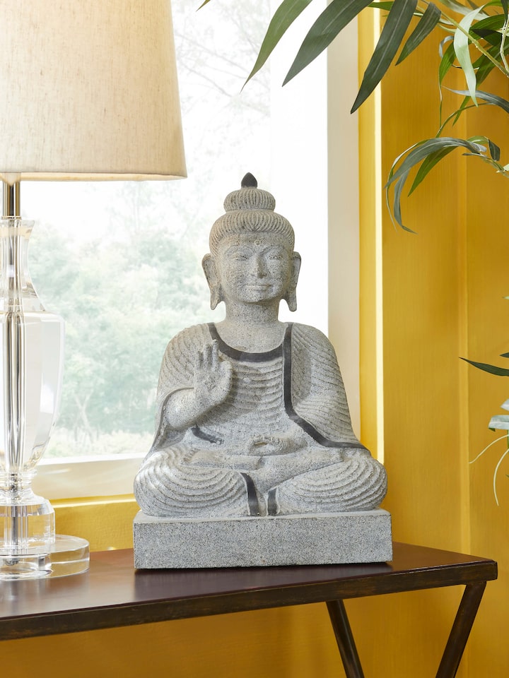 Side view of the Stone Carved Buddha Idol