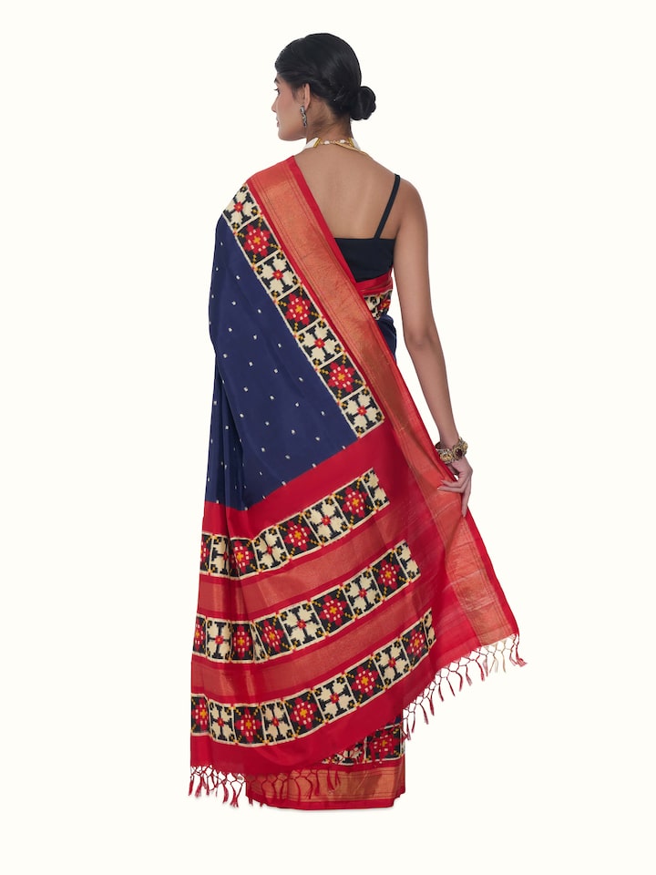 Back view of blue silk Pochampally double ikat saree displaying overall design